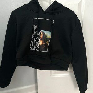 Black cropped Mona Lisa sweatshirt.
